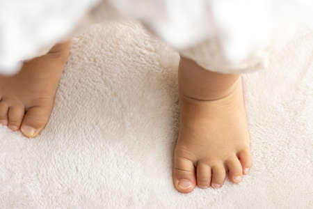 Baby's feet that stood up (1 year and 2 months old, girl, Japanese)