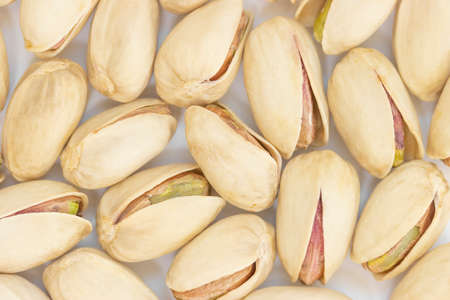 Lots of pistachios (white background)の写真素材