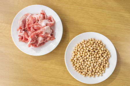 Soybeans and pork. Image of soy meatの写真素材