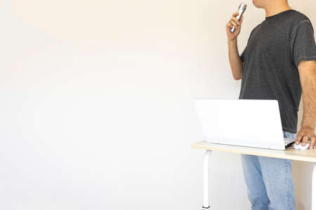 Image of a man giving a presentation (Japanese, 30s, shirt)の写真素材