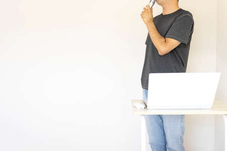 Image of a man giving a presentation (Japanese, 30s, shirt)の写真素材