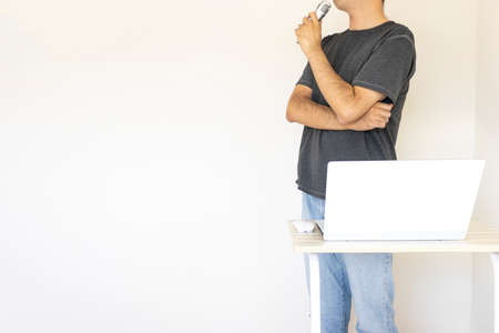 Image of a man giving a presentation (Japanese, 30s, shirt)の写真素材