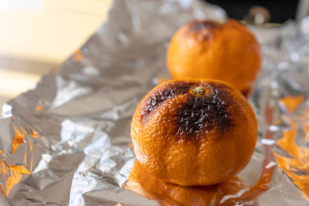 Image of baking oranges in an oven toasterの写真素材