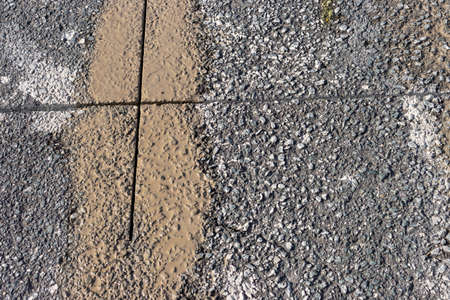 Roads with cuts due to sewer plumbing workの写真素材