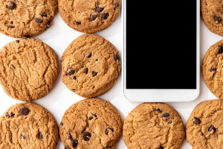 Smartphone and cookies. Digital device cookie image.
