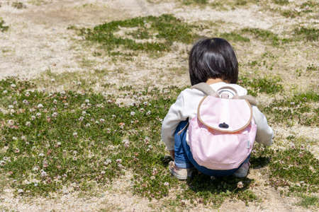 Baby walking with a rucksack on his back (1 year and 10 months old, girl, Japanese)