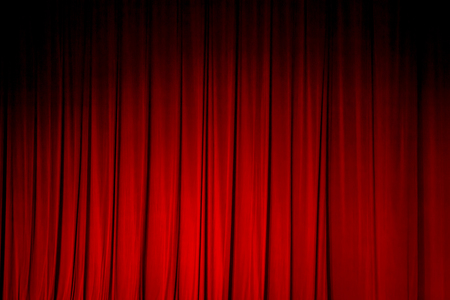 Red curtains in a theater scene of the show.の写真素材