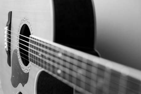 Closeup acoustic guitar on white background. Acoustic guitar that is classic and beautiful