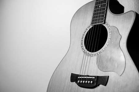 Closeup acoustic guitar on white background. Acoustic guitar that is classic and beautifulの写真素材