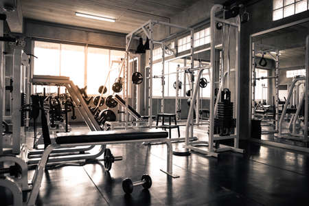 Within gym with modern fitness equipment for fitness events and more. Modern of gym interior with equipment. Sports equipment in the gym.の写真素材