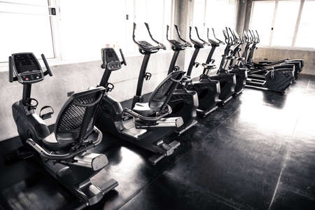 Cardio machine in gym with modern fitness equipment for fitness events and more. Modern of gym...