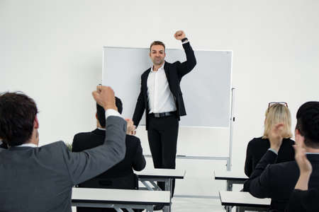 Meeting and planning of working as a team together of Asian people and foreigners at white meeting room. Concept of working together as a team.の写真素材