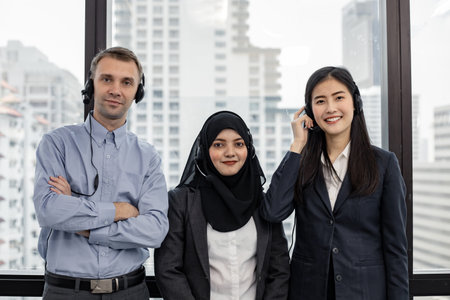 Group of diverse telemarketing customer service staff team in call center. Smiling of customer...
