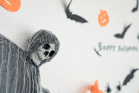 Hanging ornament, scenes in Halloween festival on wall in the room. Decoration of the decor in...