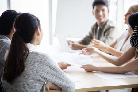 Business people discussing together in conference in the meeting room. Meetings and consultations of business people.の写真素材