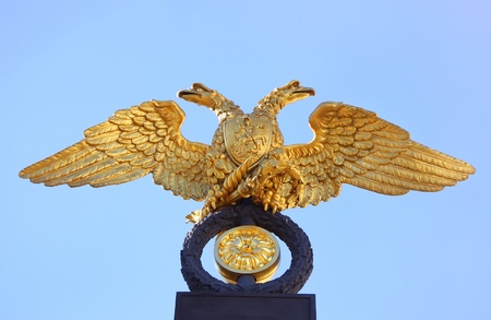 Russia arms with double-headed eagle on  blue sky backgroundの写真素材