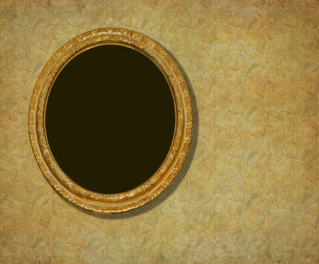 Golden oval frame over  vintage  wallpaperの写真素材