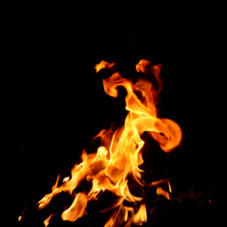 Red fire and flame on a black backgroundの写真素材