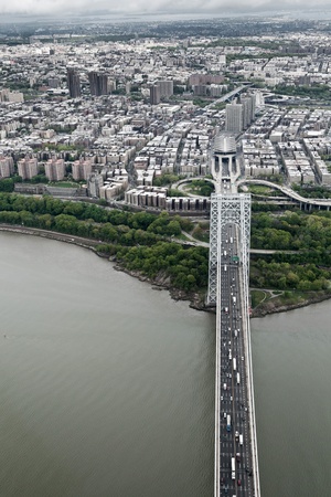  Helicopter view of Upper West side of Manhattan and George Washington bridge and Hudson River, New...