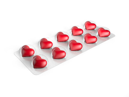 Hart pills in blister isolated on white backgroundの写真素材