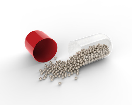 Red capsule with the granules of drugs inside. Concept 3D illustration.の写真素材