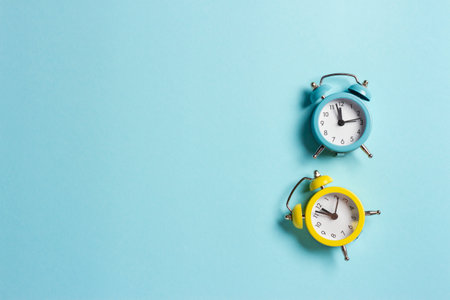 Yellow and blue vintage clock in the form of symbols of Ukraine on a blue background in honor of...