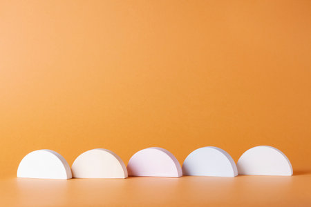 Composition with concrete slices in the style of minimalism on a delicate background.の写真素材
