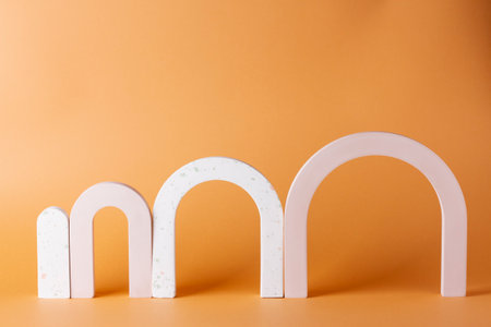 Composition with concrete arches in the style of minimalism on a delicate background.の写真素材