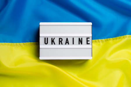 Lamp with the text Ukraine on the background of the flag.の写真素材