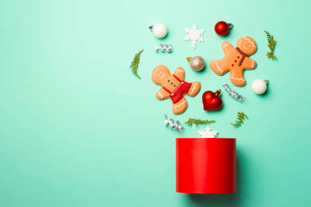 Christmas composition with decorations and cookies on a mint background.の写真素材