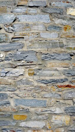 rough wall stone texture close up verticalの写真素材