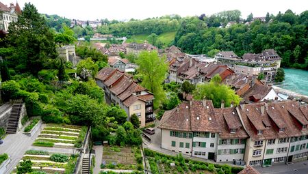Landscape of old town city and river on bridge in Bern Switzerlandの写真素材