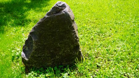 Stone and field in countrysideの写真素材