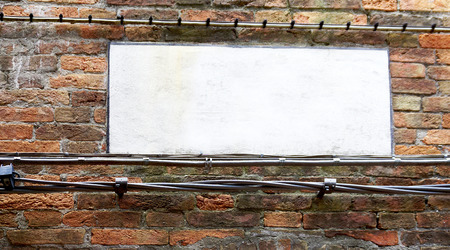 blank sign on brick wall in Venice, Italyの写真素材