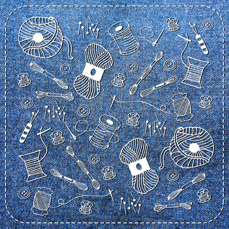 white sewing sketch on blue jeans denim backgroundの写真素材