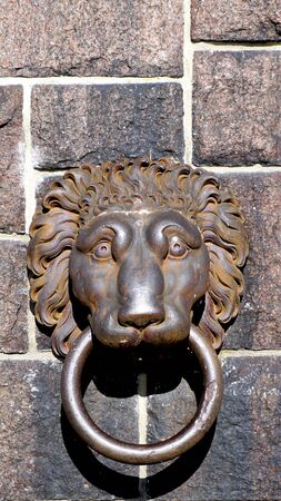 lion door handle at cityhall in stockholm, Swedenの写真素材