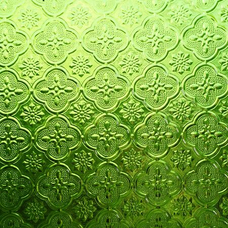 green color glass with thai pattern styleの写真素材