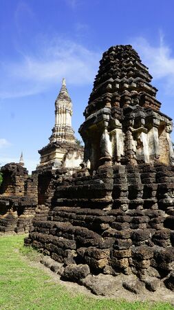 closeup angled view Historical Pagoda Wat chedi seven rows temple in Sukhothai Thailandの写真素材