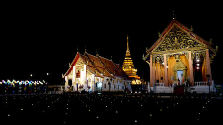 Wat Phra That Chang Kam at Nan of Thailand night timeの写真素材