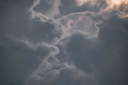 These images of a storm approaching rural parts of india were shot during low light condtions using a telephoto lens and fully zoomedの写真素材