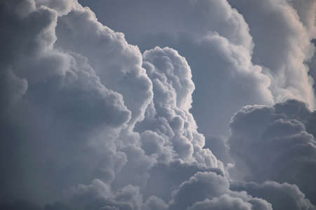 These images of a storm approaching rural parts of india were shot during low light condtions using a telephoto lens and fully zoomedの写真素材