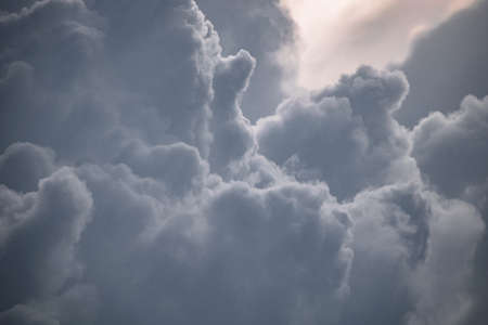 These images of a storm approaching rural parts of india were shot during low light condtions using a telephoto lens and fully zoomedの写真素材