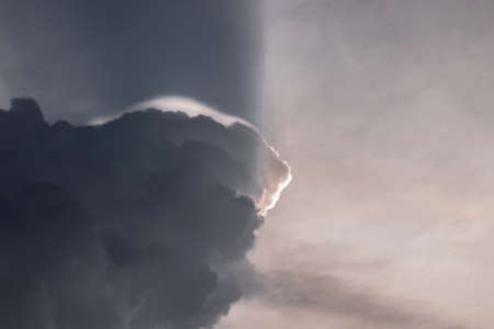 These images of a storm approaching rural parts of india were shot during low light condtions using a telephoto lens and fully zoomedの写真素材