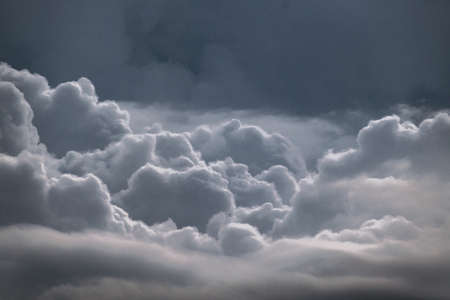 These images of a storm approaching rural parts of india were shot during low light condtions using a telephoto lens and fully zoomedの写真素材