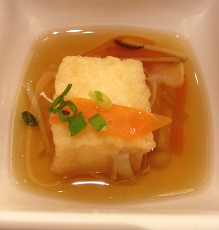 Yellow-square meat ball with vegetablesの素材