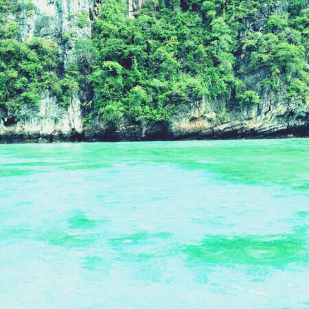 Emerald sea with the rock mountainの素材