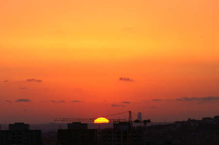 building site and sinking sun, nightfall in Istanbulの写真素材
