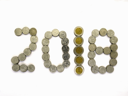The isolated Thai coin on the white background which the 2018 shape