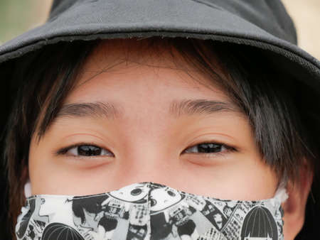 Face of the child waring mask during Corona virus situationの写真素材