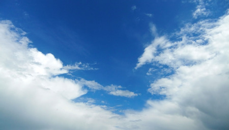 white clouds in the blue skyの写真素材